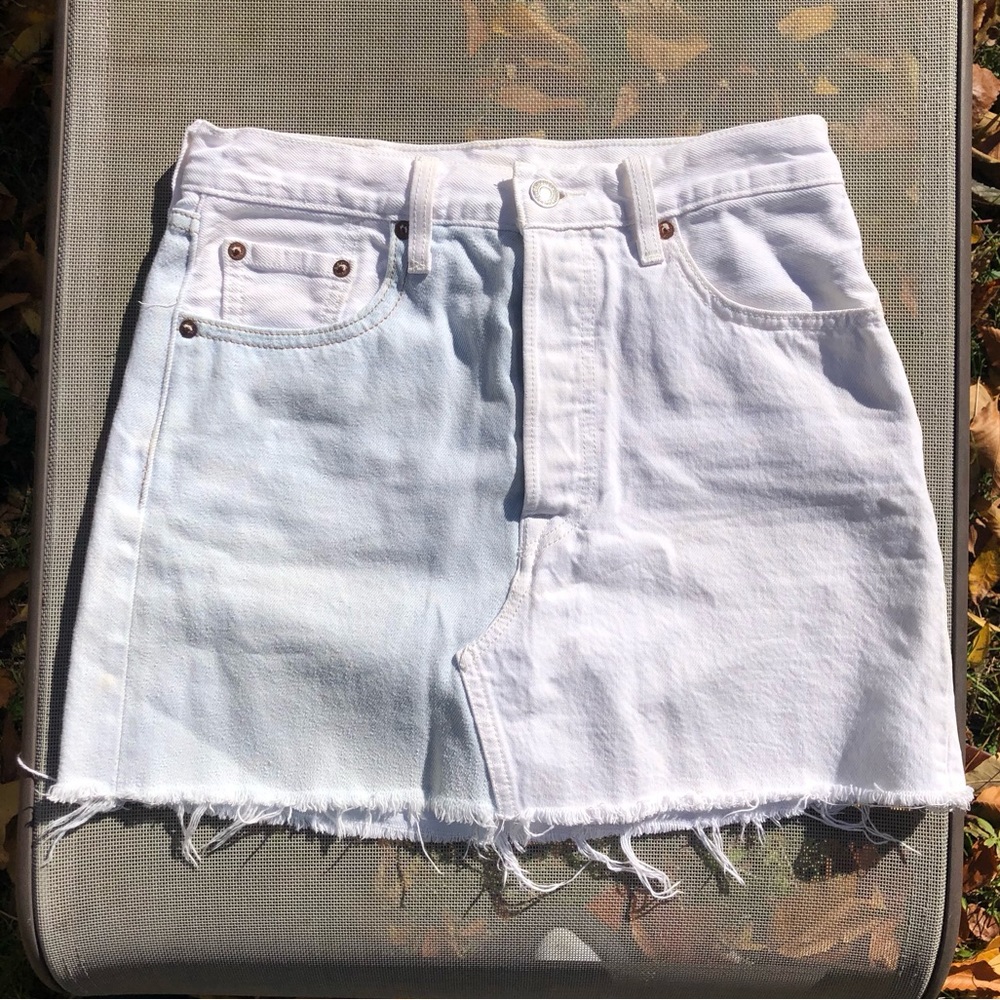 Levi’s half and half denim mini skirt in white and light wash denim, size S/W26.
